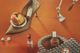Image may contain: Clothing, Footwear, Shoe, High Heel, Cosmetics, Lipstick, Bottle, and Perfume