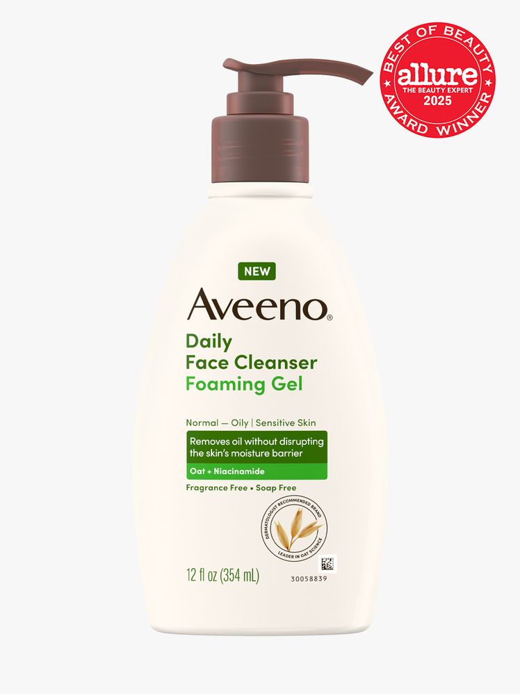 Aveeno Daily Face Cleanser Foaming Gel in branded white bottle with brown pump on light gray background with red Allure...