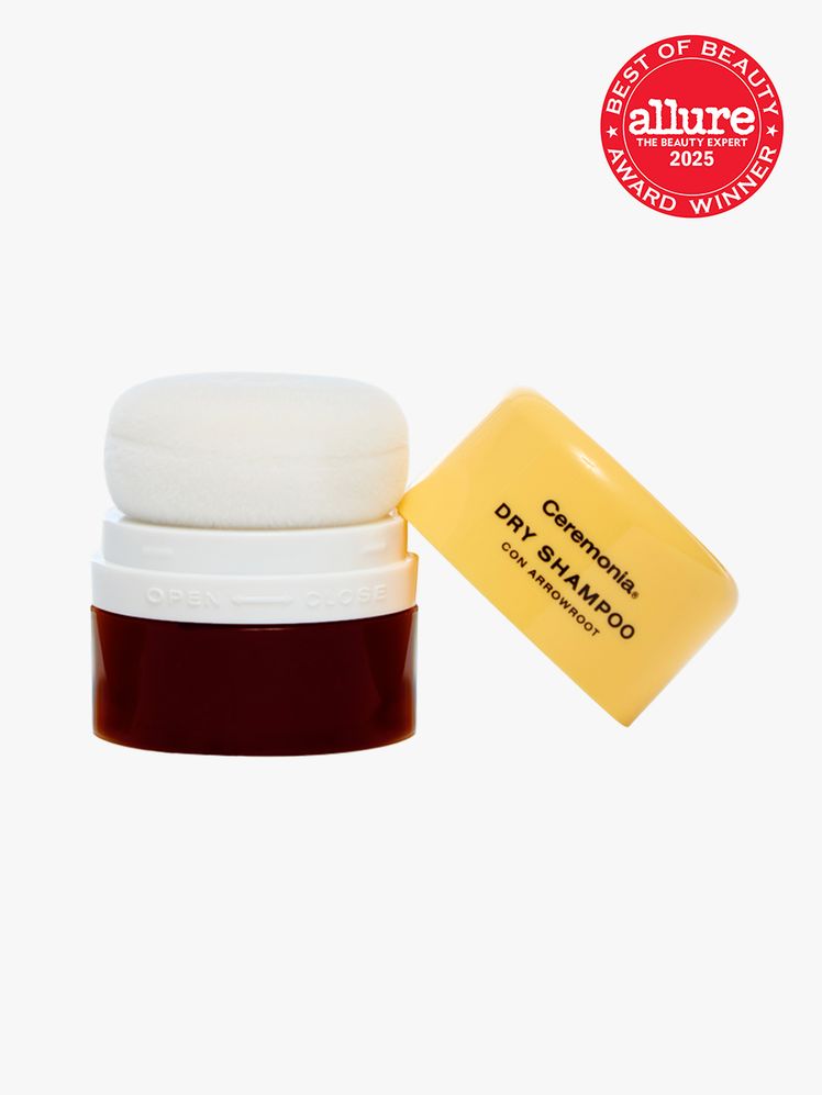 Ceremonia Dry Shampoo con Arrowroot in branded brown jar with puff applicator on light gray background with red Allure...