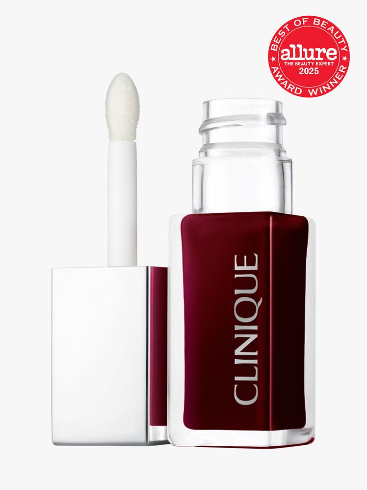 Clinique Pop Lip  Cheek Oil in Black Honey in branded glass bottle with silver cap with attached doe foot applicator on...