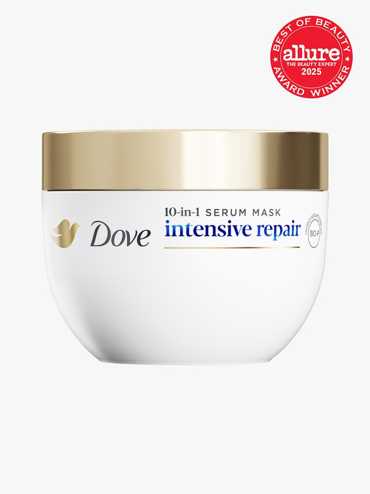 Dove Intensive Repair 10in1 Serum Mask in branded white jar with gold twist cap on light gray background with red Allure...