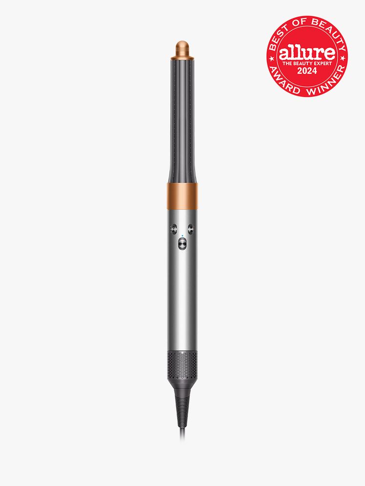 dyson airwrap in silver and copper color way on light gray background with red and white 2024 allure best of beauty seal