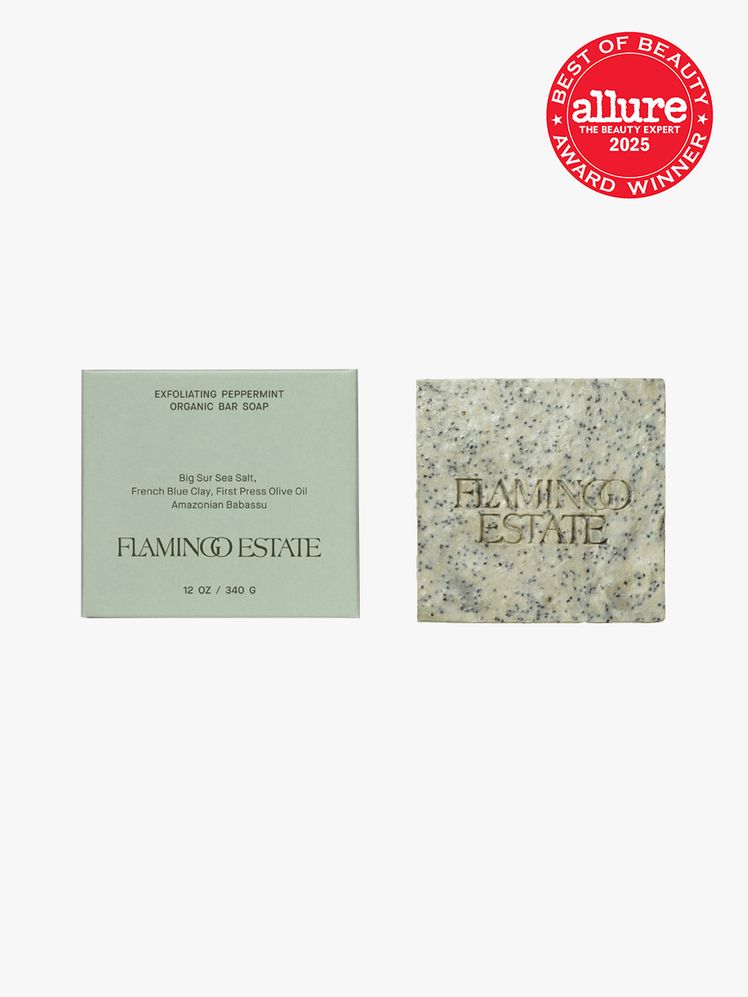 Exfoliating Peppermint Soap Brick next to branded light green box packaging on light gray background with red Allure...