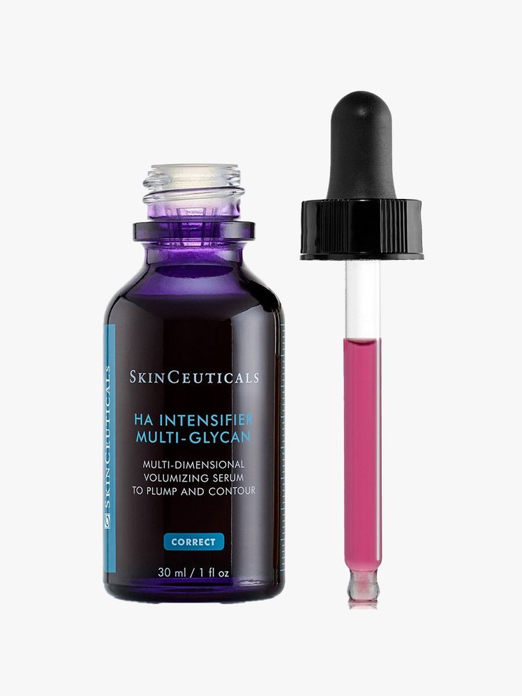 An open bottle and dropper of SkinCeuticals Hyaluronic Acid Intensifier Multi-Glycan on light gray background