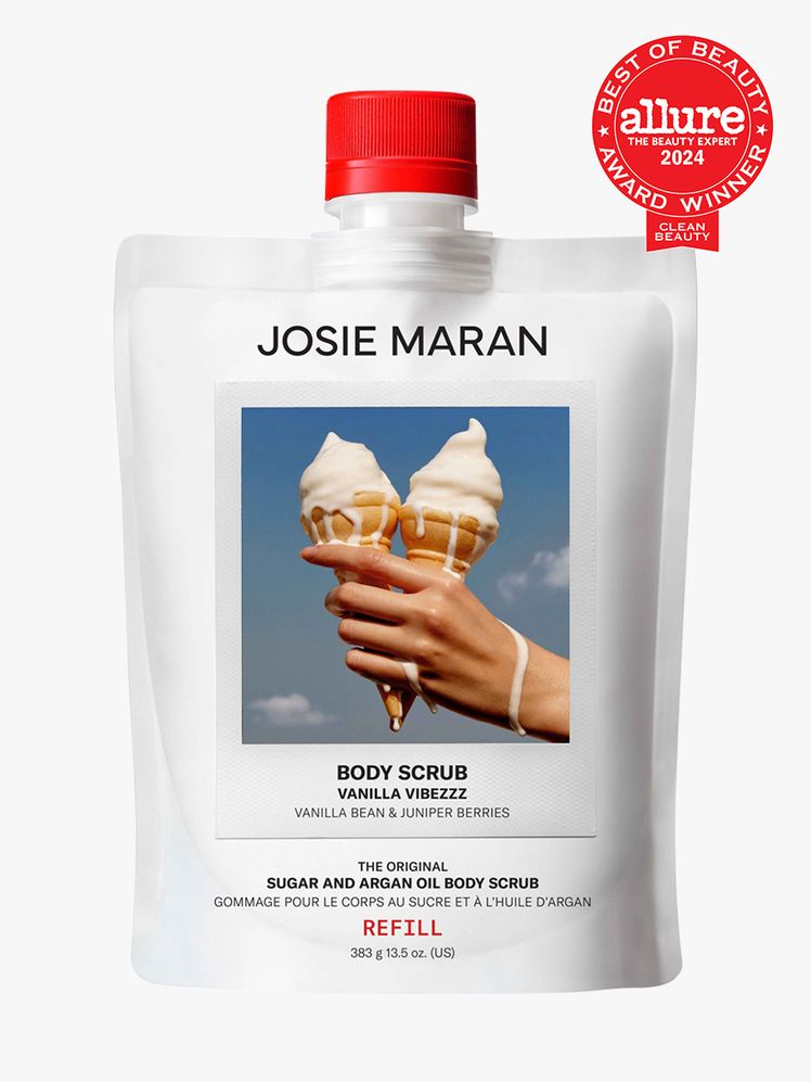 body scrub in branded white pouch with red cap on light gray background with red and white 2024 allure best of beauty seal