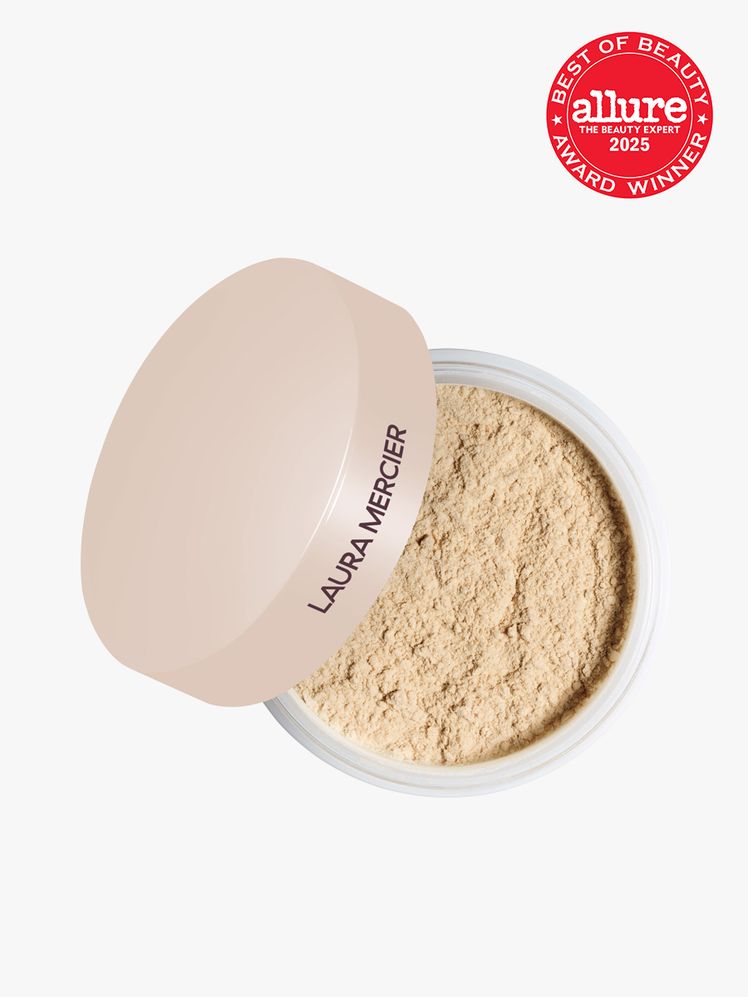 Laura Mercier Translucent Loose TalcFree Setting Powder UltraBlur in branded clear jar with soft peach lid on light gray...
