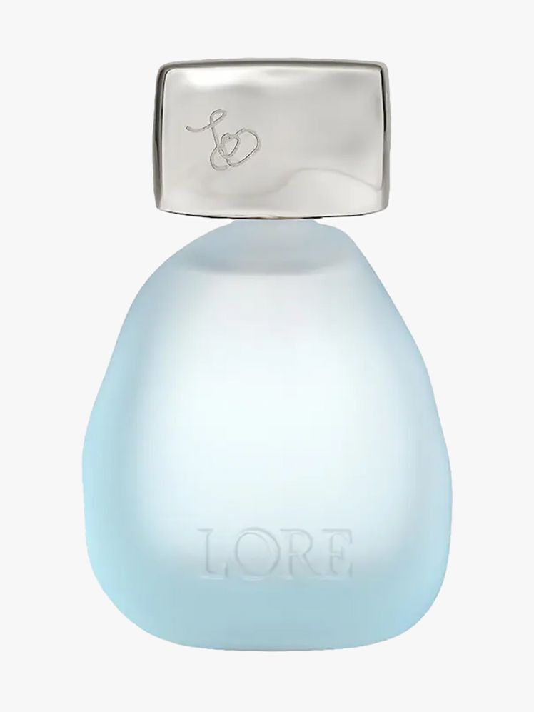 Lore Sublimity Eau de Parfum with Coconut Water in branded component on a light gray background