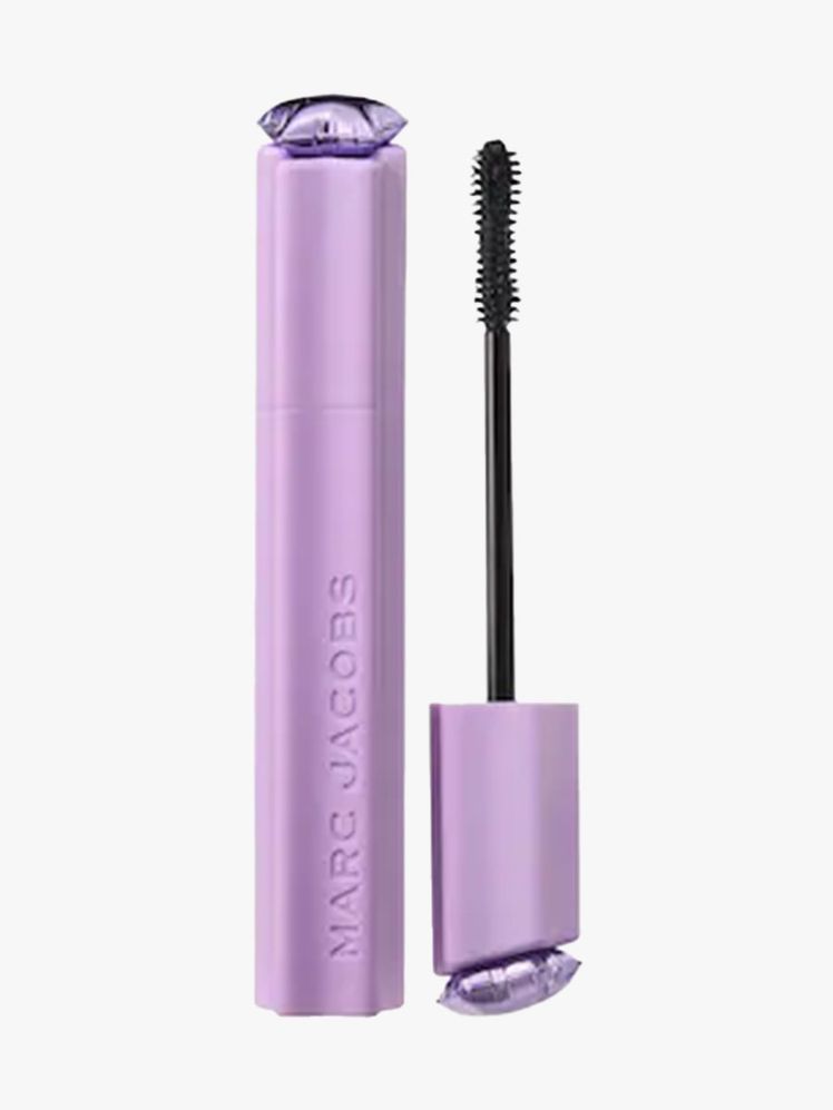Lavender tube of Marc Jacobs Beauty Flashes Mascara on light gray background