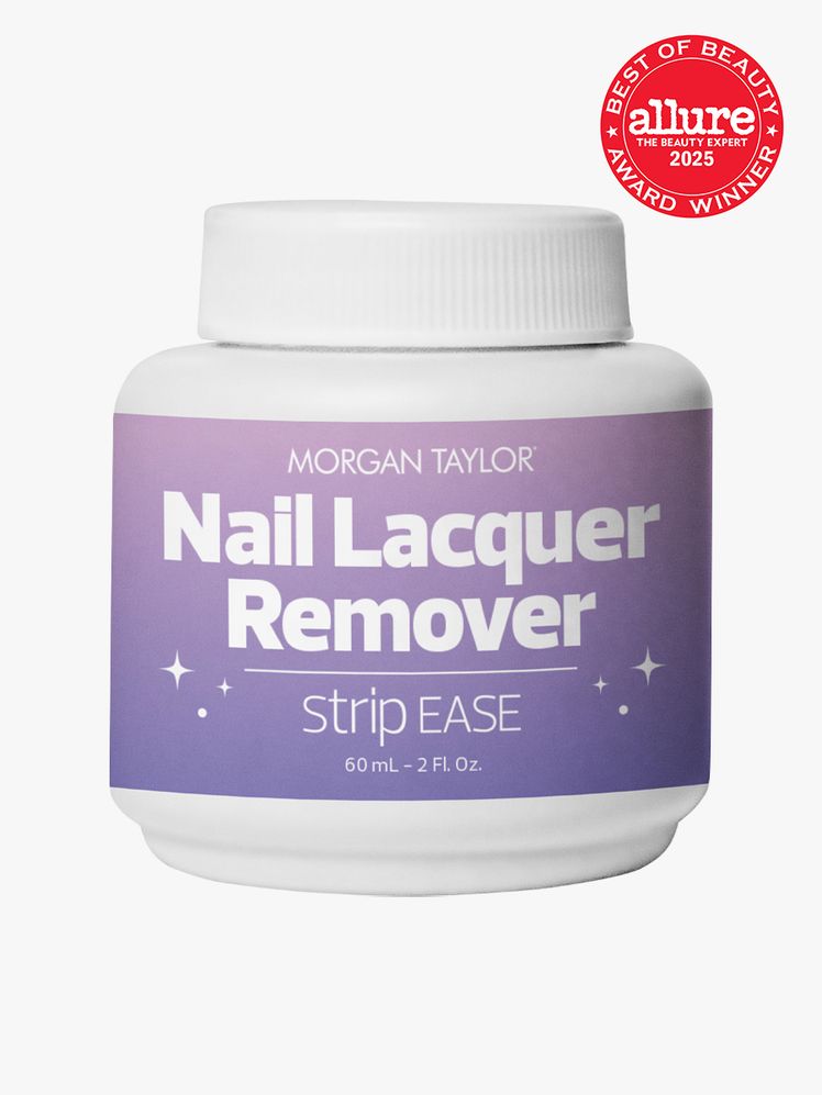 Morgan Taylor Strip Ease Nail Lacquer Remover in branded white jar with cap on light gray background with red Allure...