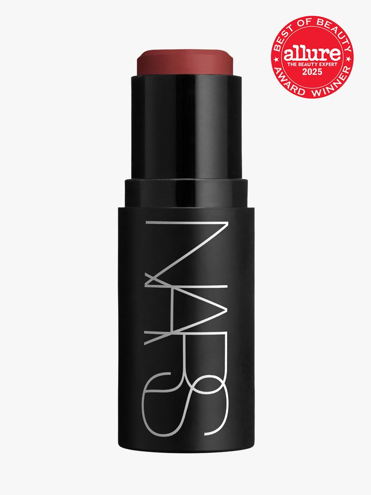 Nars The Multiple in branded black twist up applicator on light gray background with red Allure Best of Beauty seal in...