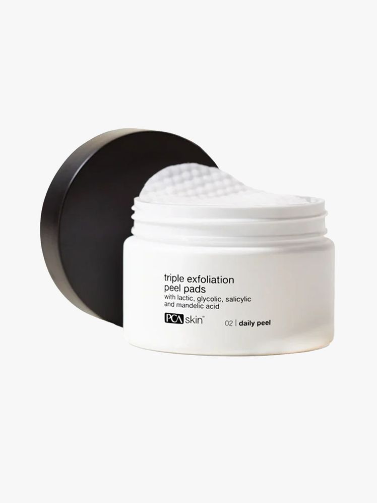 PCA Skin Triple Exfoliation Peel Pads white jar with black lid on light gray background