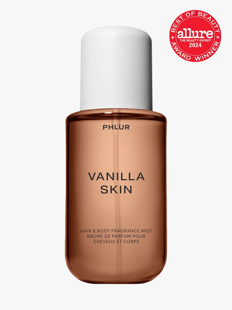 Phlur Vanilla Skin Body  Hair Fragrance Mist branded bottle component with black accents on a white cap on a light gray...