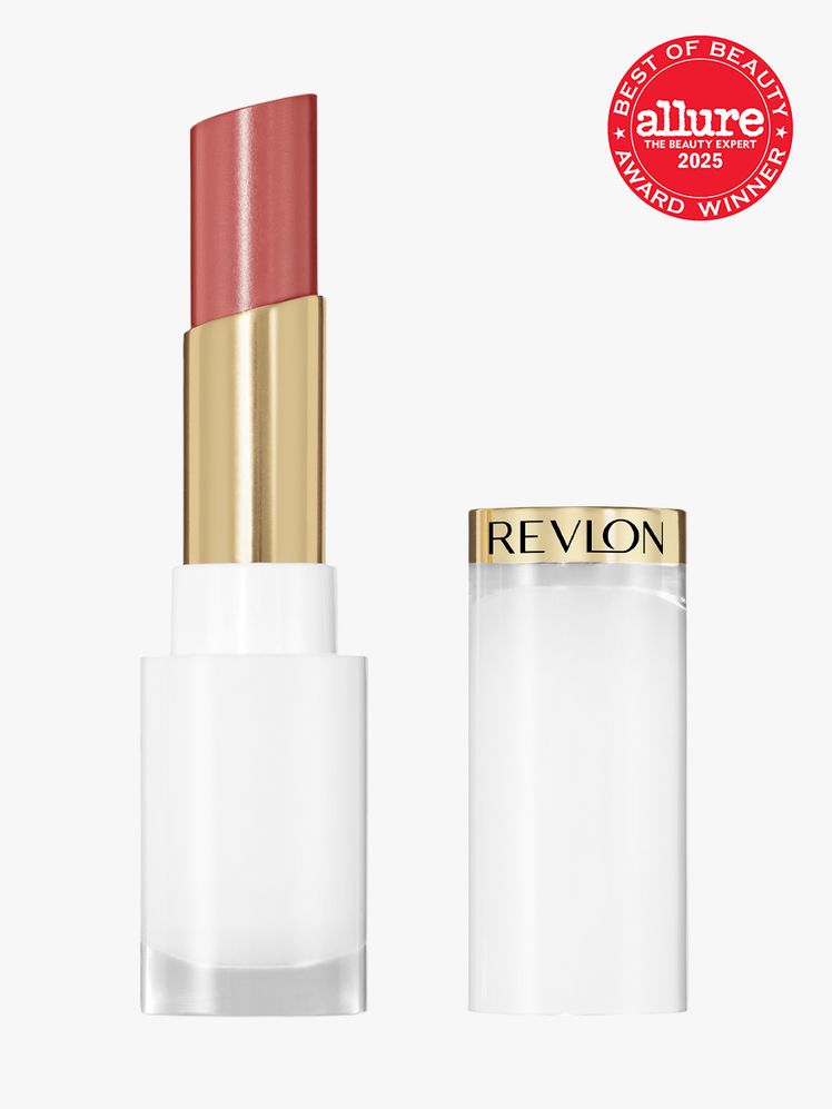 Revlon Super Lustrous Glass Shine Balm white and gold tube of lipstick balm with cap to the side on light gray...