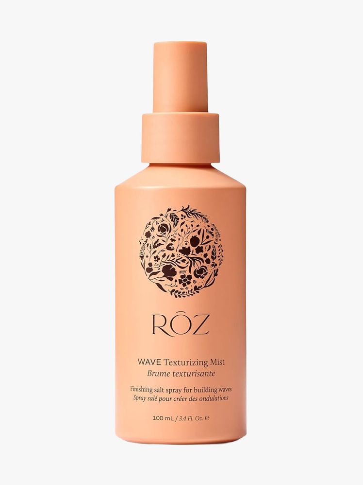 Roz Wave Texturizing Mist orange spray bottle on light gray background