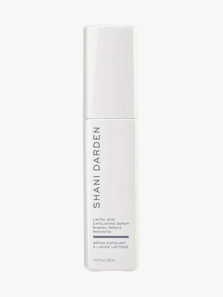 A square, white bottle of the Shani Darden Lactic Acid Exfoliating Serum on a white background