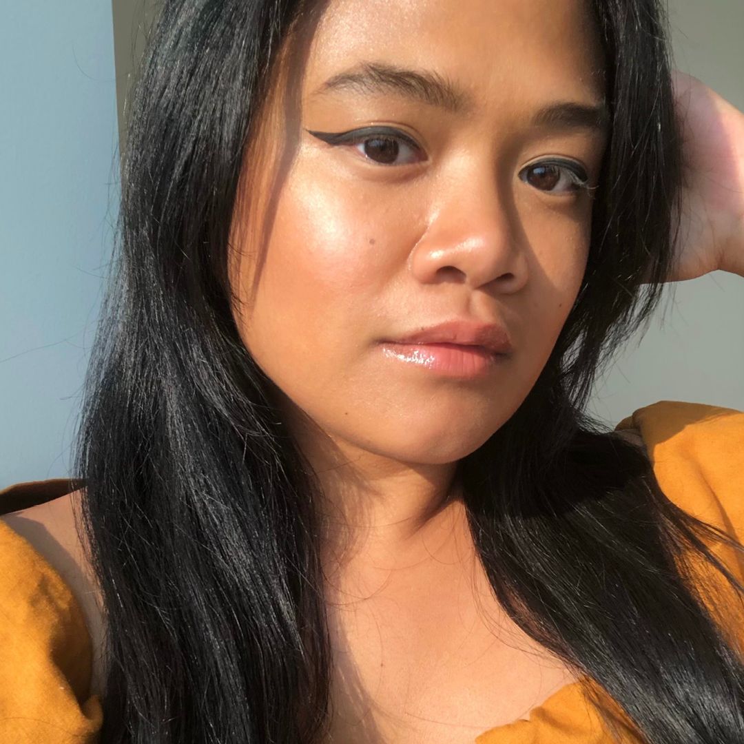 senior editor Jesa Marie Calaor's Allure headshot — Allure Magazine Editorial Team