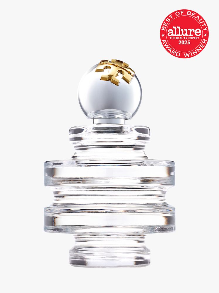 Tory Burch Sublime Eau de Parfum in clear glass bottle with decorative cap on light gray background with red Allure Best...