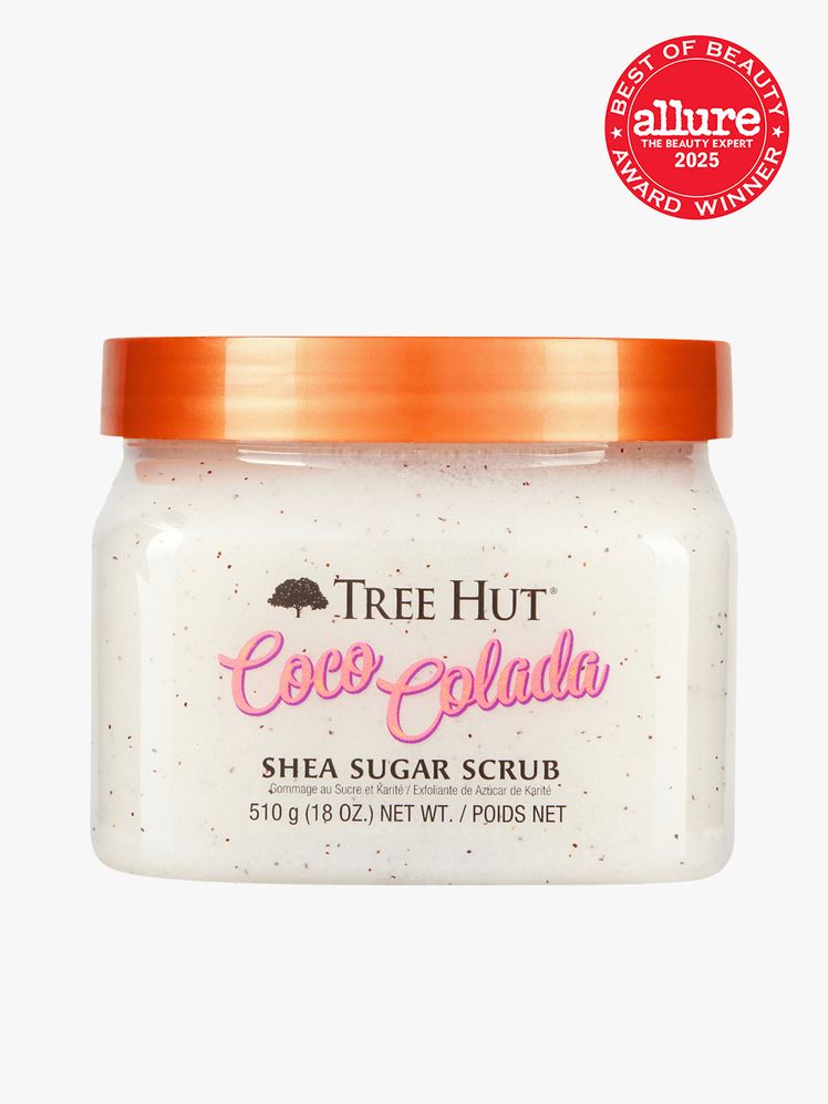 Shea Sugar Scrub in clear branded jar with orange lid on light gray background with red Allure Best of Beauty seal in...