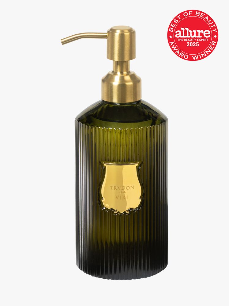 Trudon Liquid Soap Mdie in branded green bottle with gold pump on light gray background with red Allure Best of Beauty...