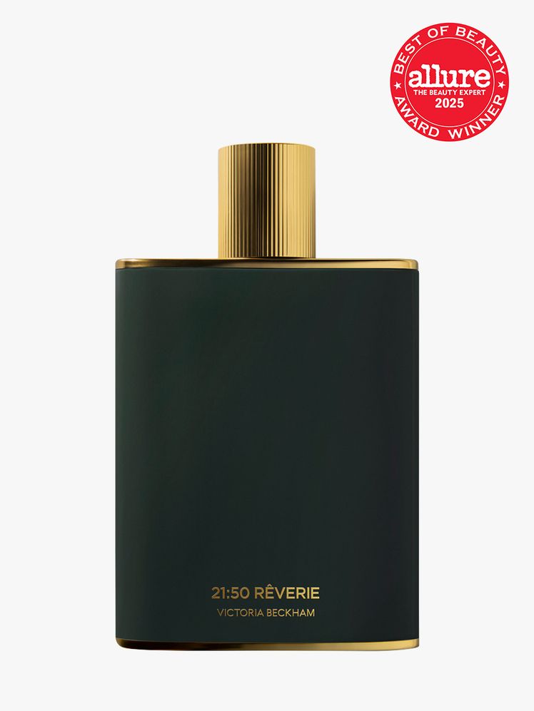 Victoria Beckham Beauty 2150 Rêverie Eau de Parfum flat green rectangle bottle of perfume with gold cap on light gray...