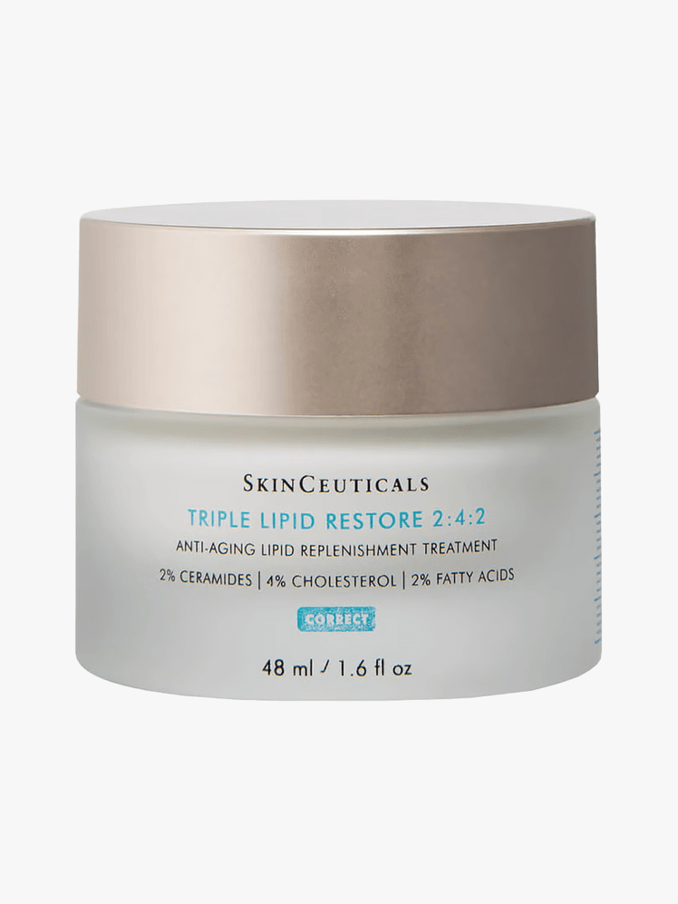 Triple Lipid Restore in frosted jar with silver lid on light gray background